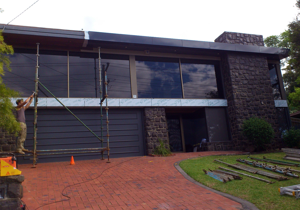 jbcs - rejuvenation of a post modern design - Alucobond Installation 04